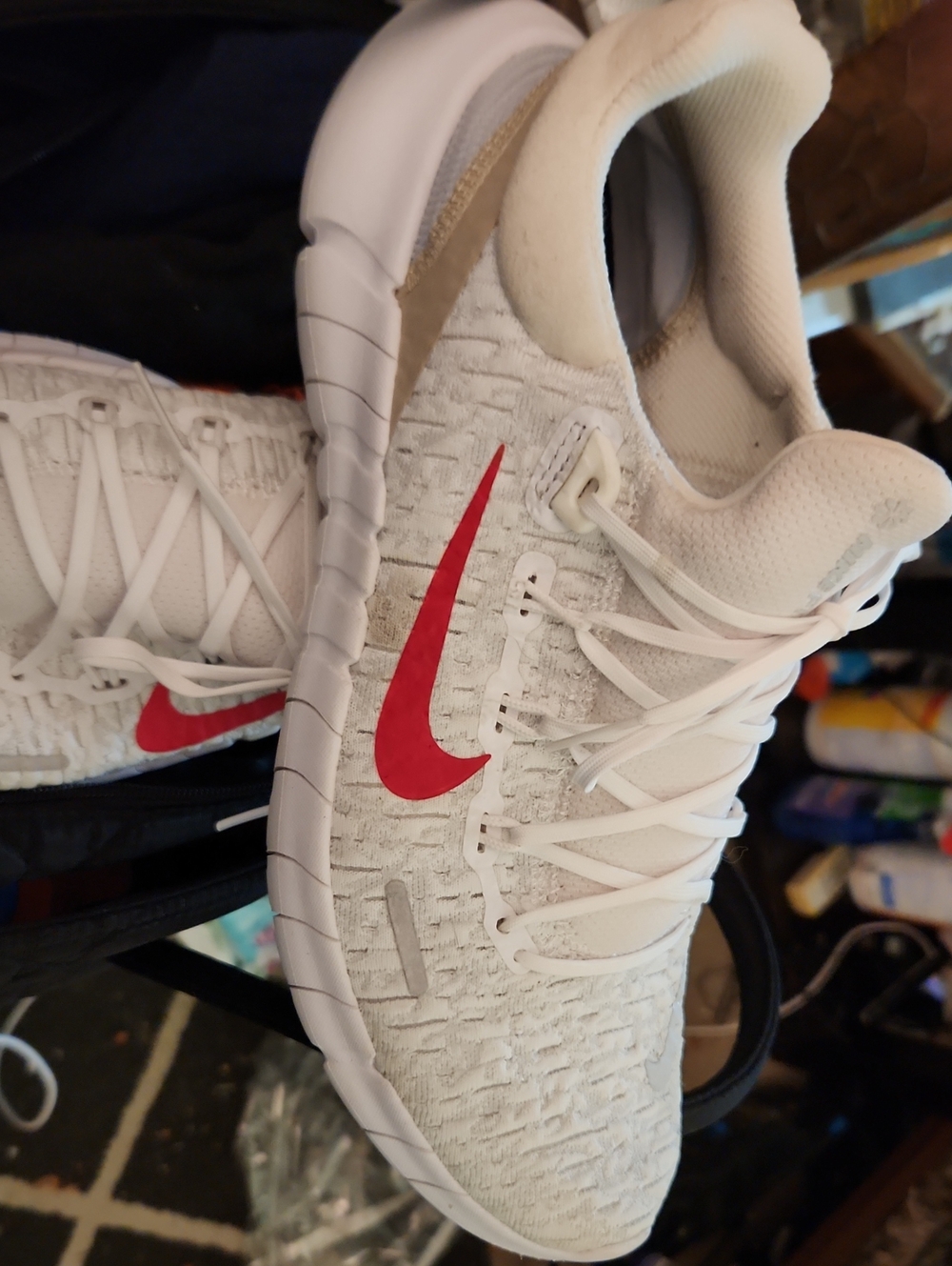 Nike White Low-Top Sneakers with Red Swoosh
